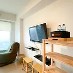 Modern And Homey Studio At Grand Kamala Lagoon Apartment By Travelio